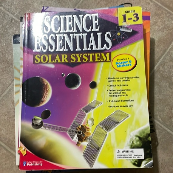 Science Essentials- Solar System by School Specialty Publishing student workbook - Picture 1 of 2